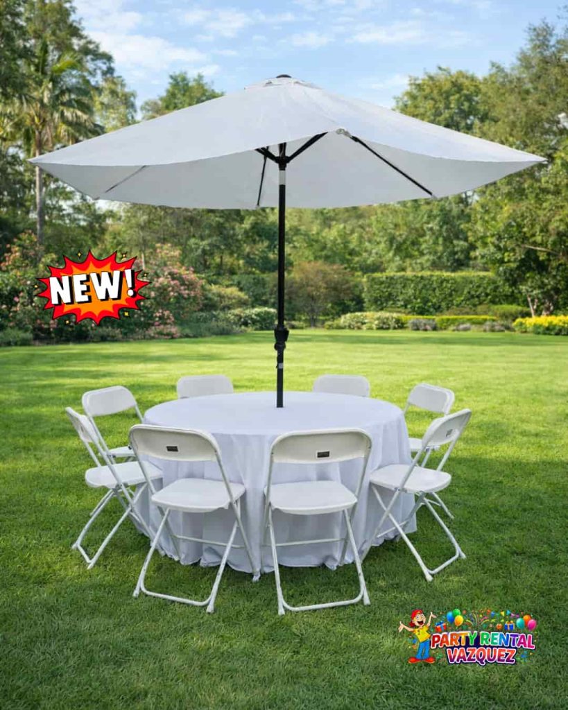 round table with umbrella and white folding plastic chairs