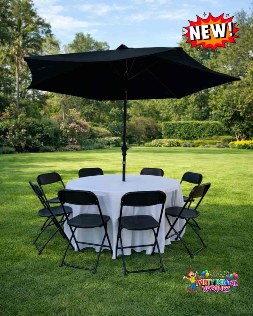 round table with umbrella and black plastic folding chairs