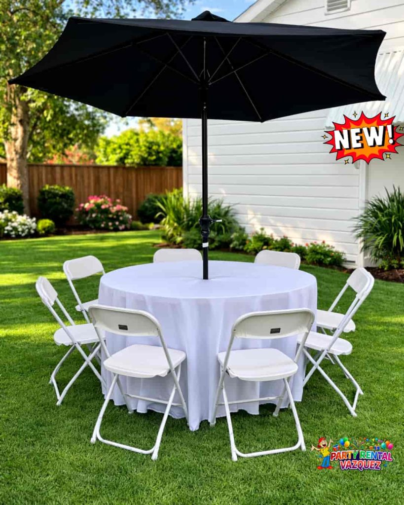 Set of round table with umbrella and white plastic folding chairs