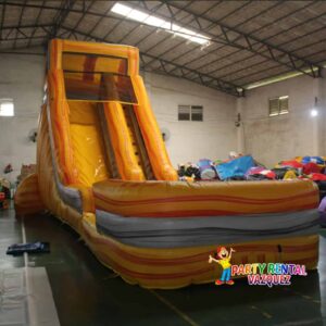 Large yellow water slide bounce house rental in Columbus, Indiana, ready for kids birthday parties, summer celebrations, backyard events, and family gatherings.