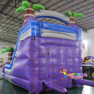Purple tropical inflatable water slide rental in Columbus, Indiana designed for safe fun, summer entertainment, and unforgettable backyard parties.