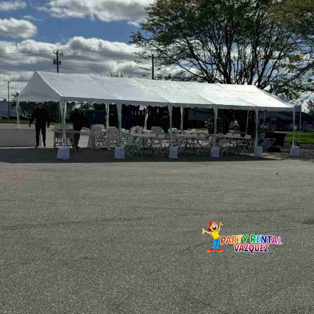 Heavy-duty concrete blocks used to securely anchor a 20x32 party tent on concrete surfaces for events in Columbus, Indiana.